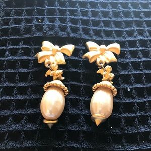 Gold tone cherub and pearl clip back drop earrings